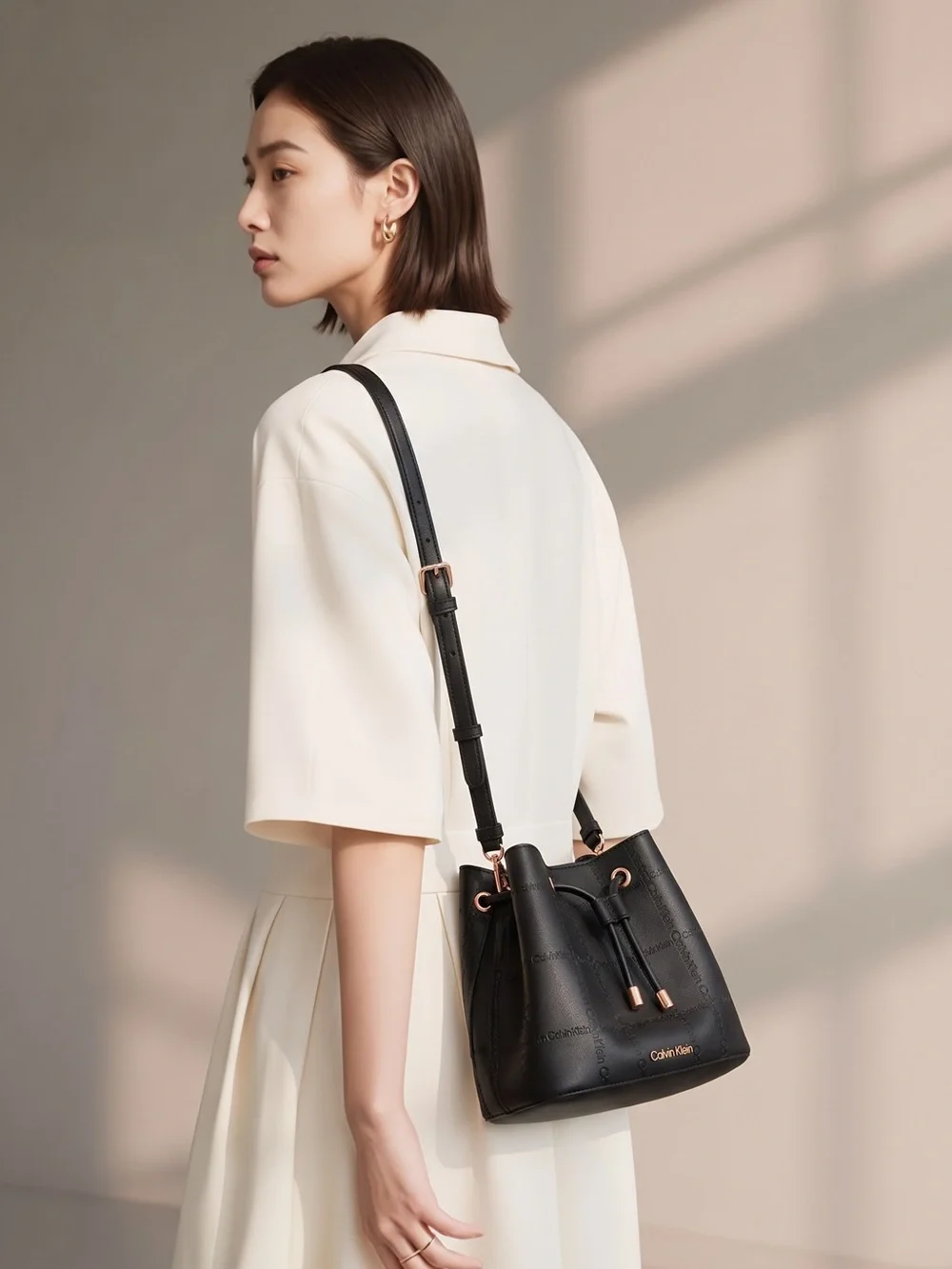 Calvin Klein Black Logo-Embossed Drawstring Bucket Bag